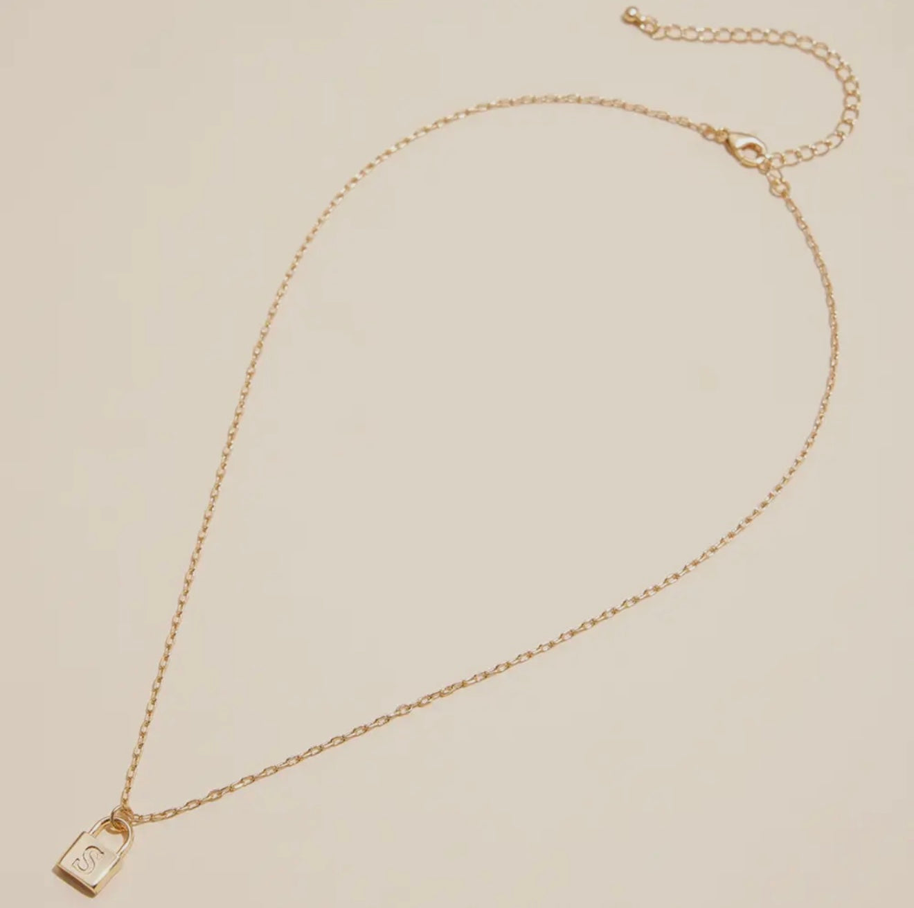 Gold lock initial necklace