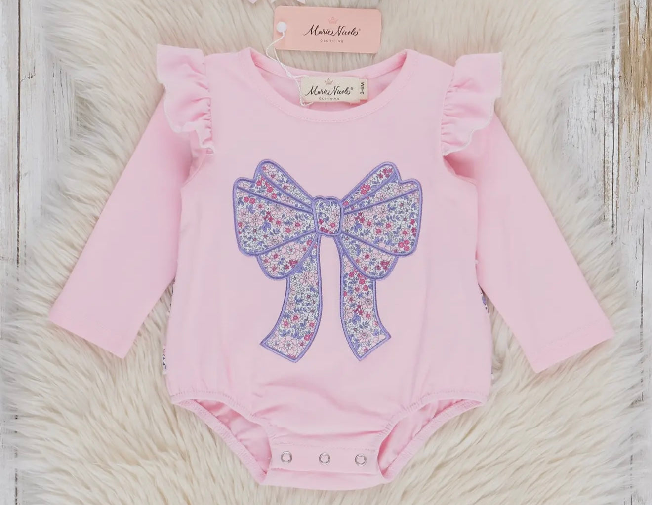 Delicate flower bow ruffle bubble