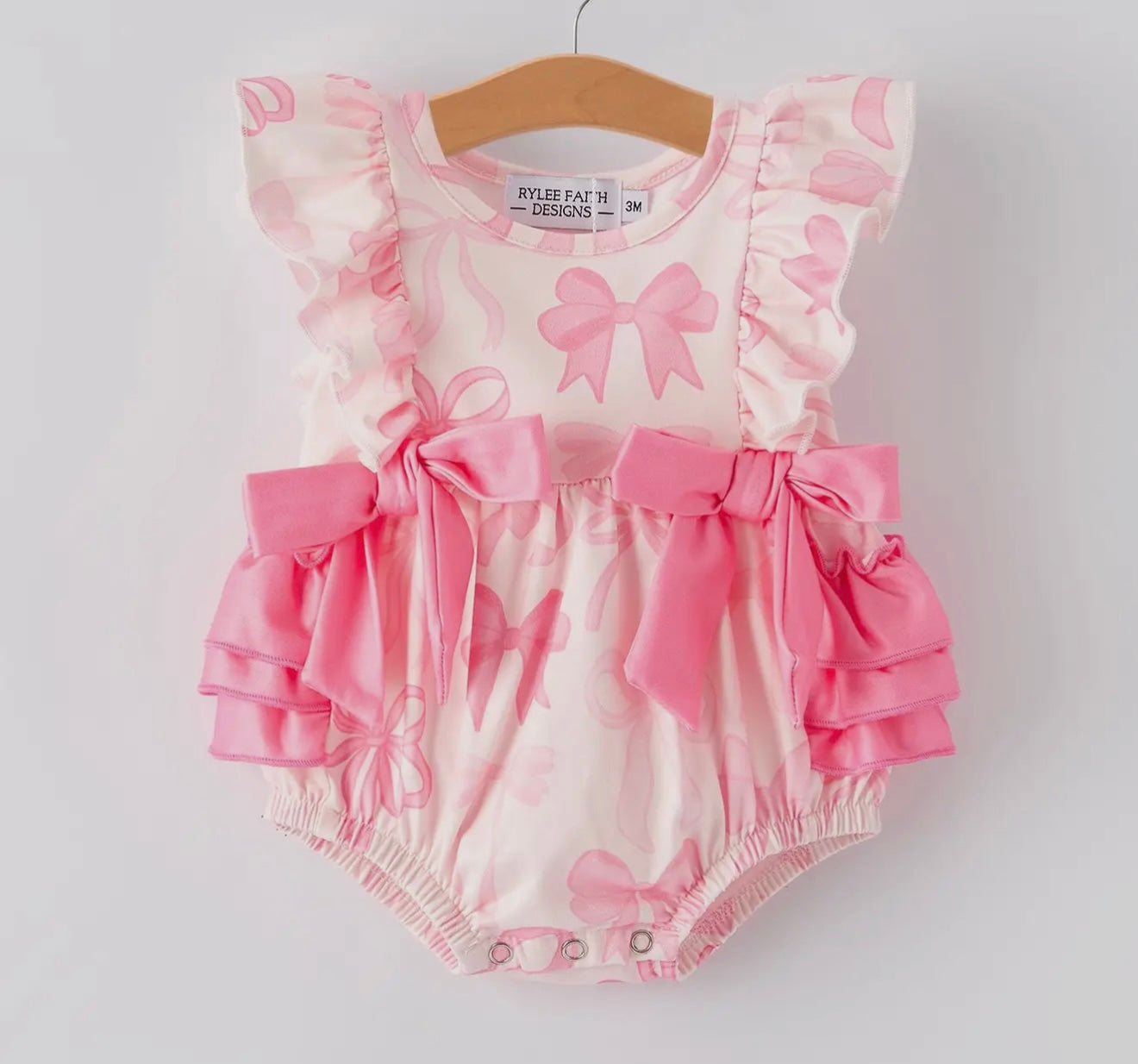Baby girls pink bow print romper