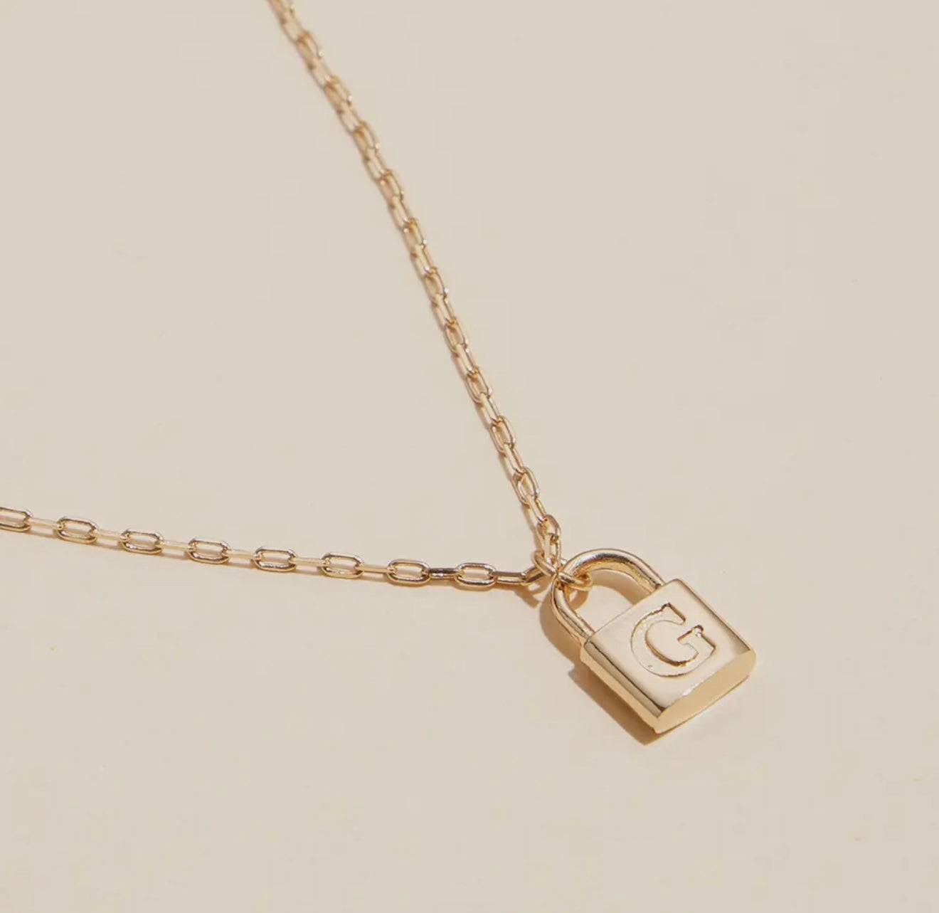 Gold lock initial necklace