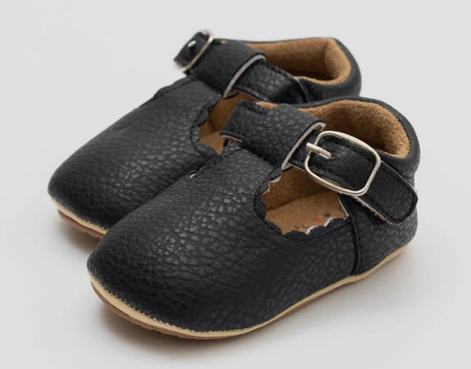 T-strap scalloped buckle shoes black