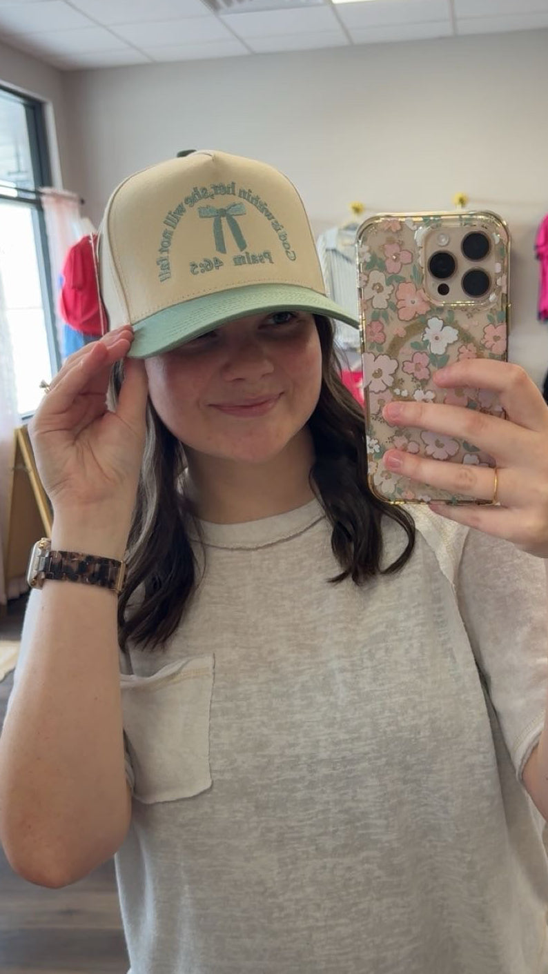 She is clothed trucker hat